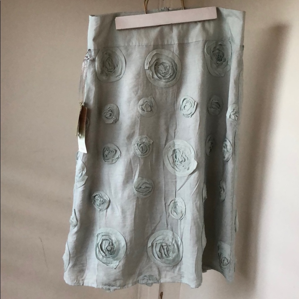 Rosy cheeks shimmery mint green skirt